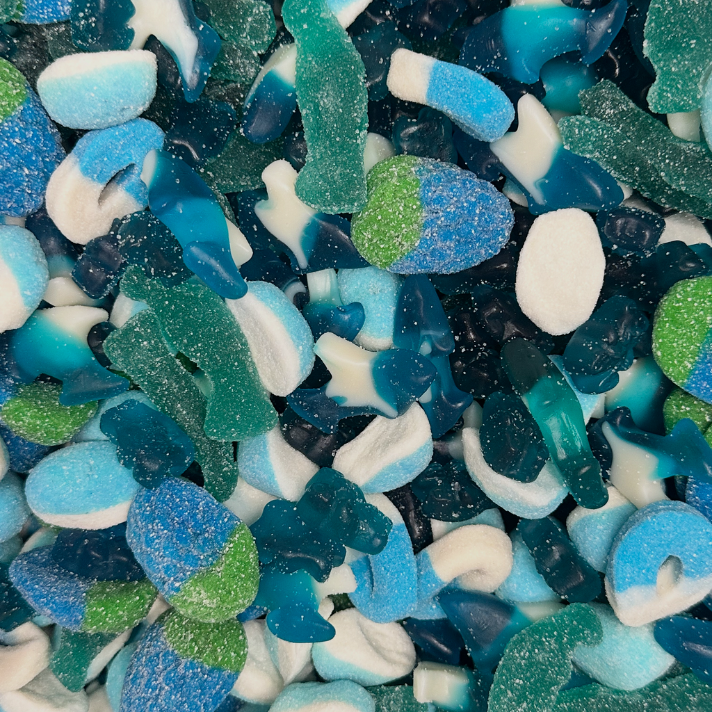 Colorful sea glass pieces in various shades of blue, green, and white.